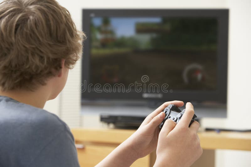 Boy Playing With Game Console