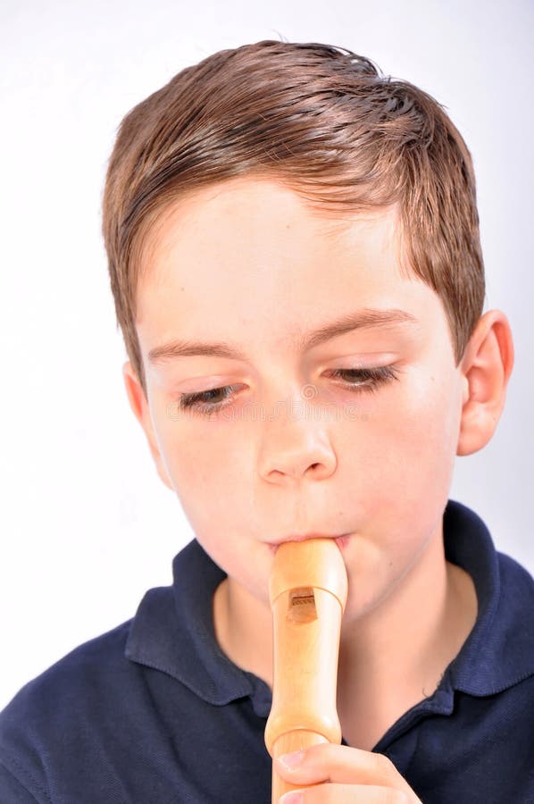 Boy playing recorder