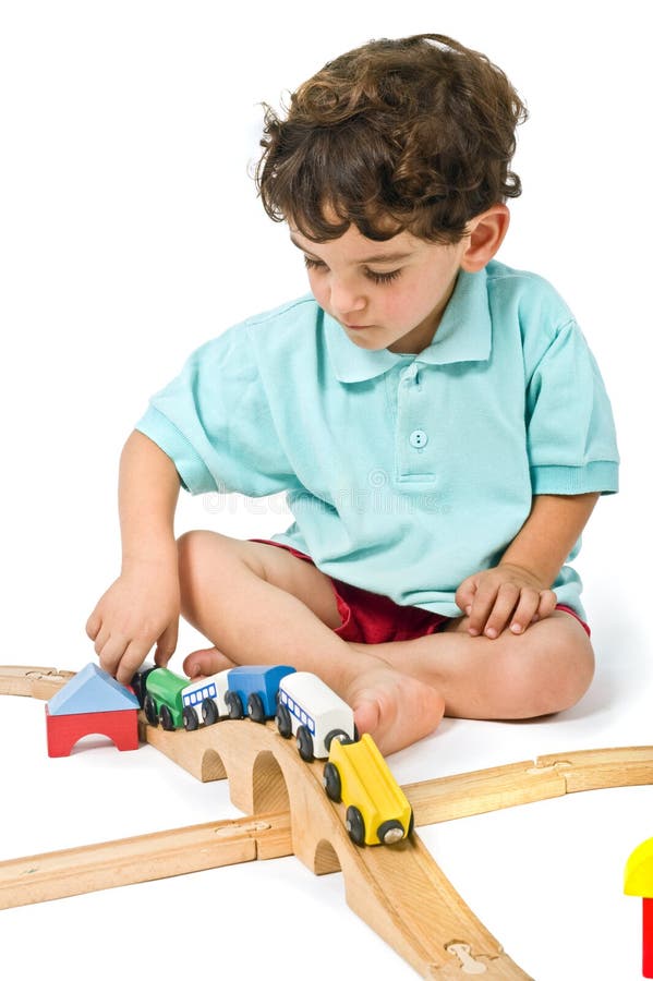 Boy playing with train