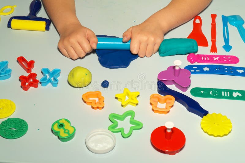 Boy Plays with Playdough on the Table Stock Photo - Image of hands ...