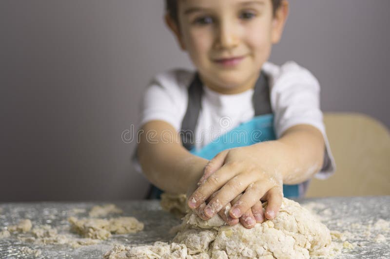 Boy Prepearing Pizza Dough Stock Photos Free & RoyaltyFree Stock