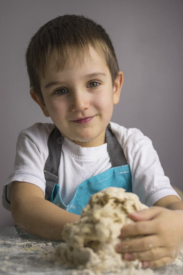 Boy Prepearing Pizza Dough Stock Photos Free & RoyaltyFree Stock