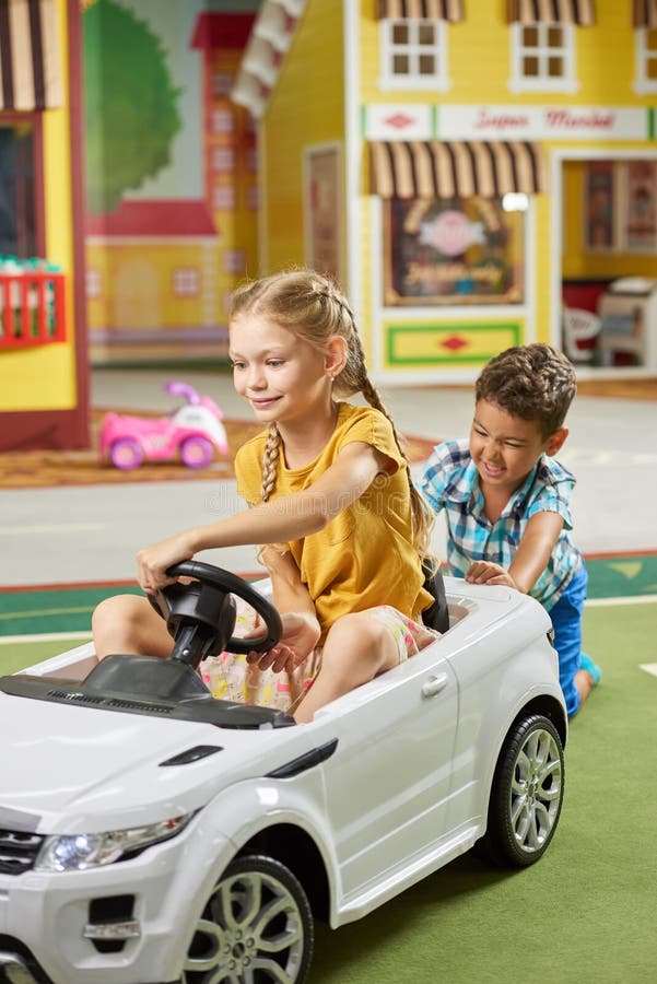 Little Boy Pushing Toy Car Indoor. Stock Photo - Image of center ...