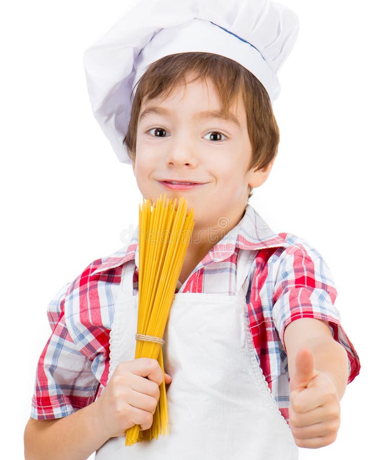 Boy with raw spaghetti