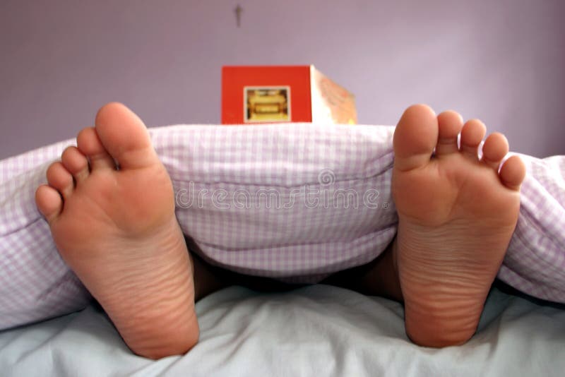 Boy reading in bed