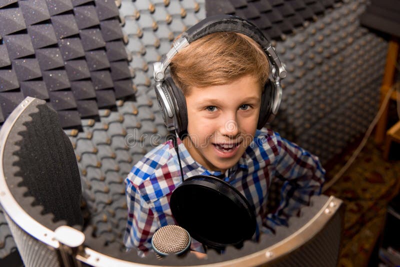 Boy in a recording studio stock photo. Image of broadcast 107244462
