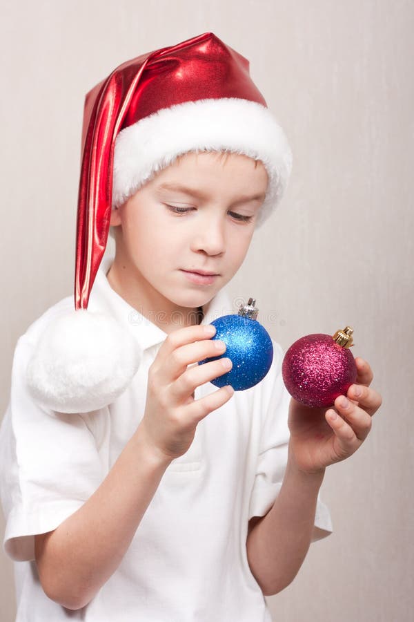 Boy in red christmas hat