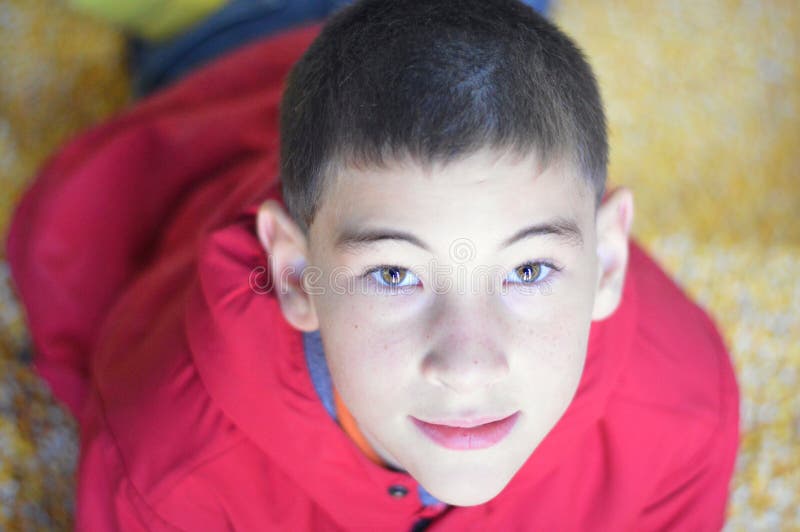 Boy with Red Coat Looking Up Stock Image Image of looking, wearing