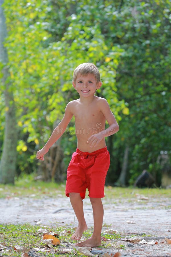 Boy in red shorts