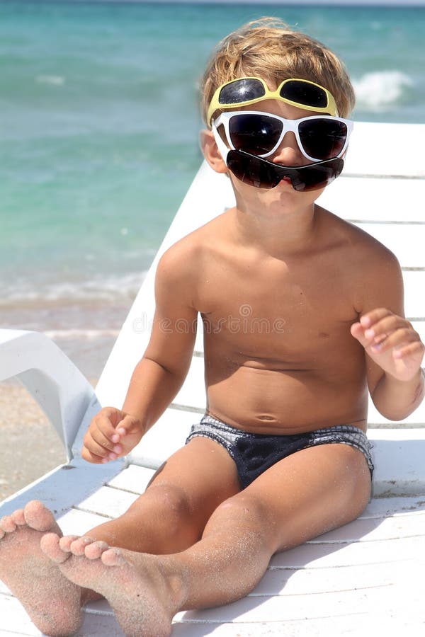 Boy relaxing on beach