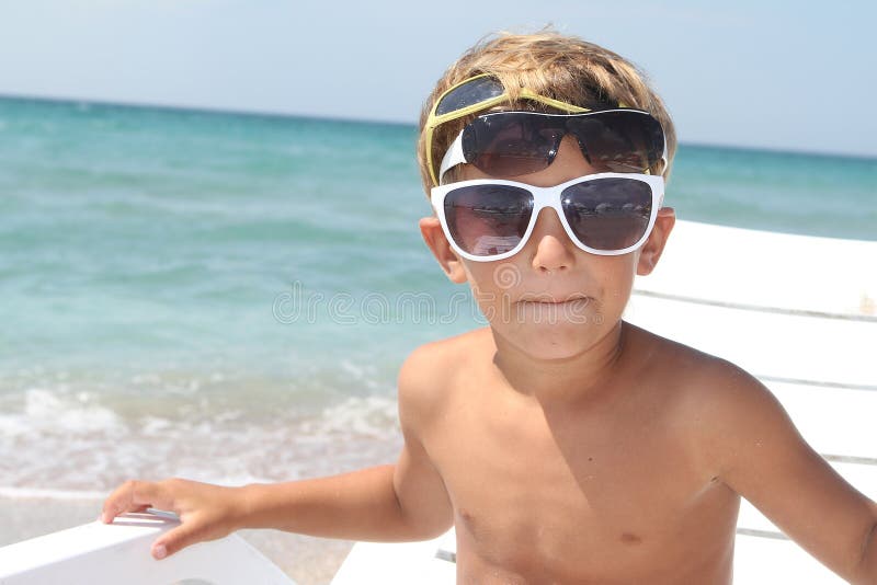 Boy relaxing on beach