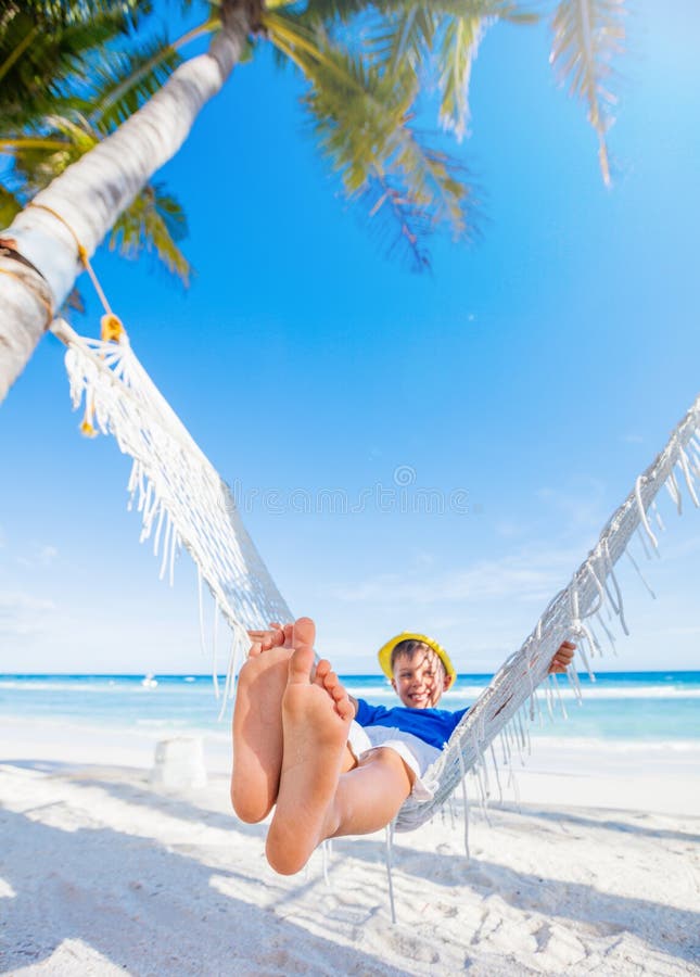 Boy relaxing on a beach.