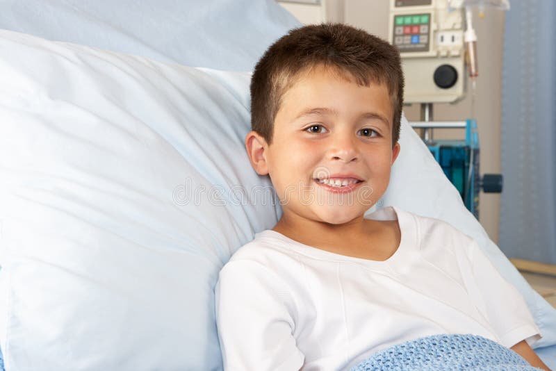 Boy Relaxing in Hospital Bed Stock Photo Image of childrens, smiling