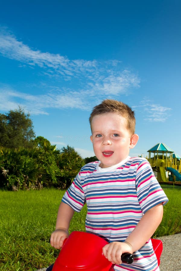 Boy Riding on a Toy Motorbike Stock Photo Image of childhood, pilot