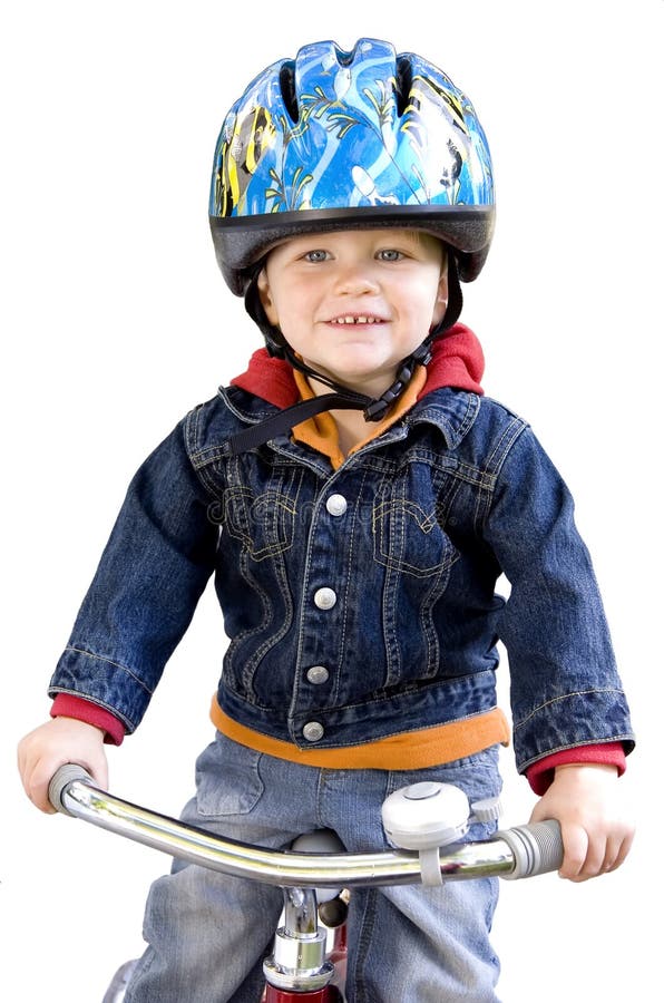 Boy wearing helmet riding tricycle on isolated white background - see 5489663 for non isolated version of this photo. Boy wearing helmet riding tricycle on isolated white background - see 5489663 for non isolated version of this photo