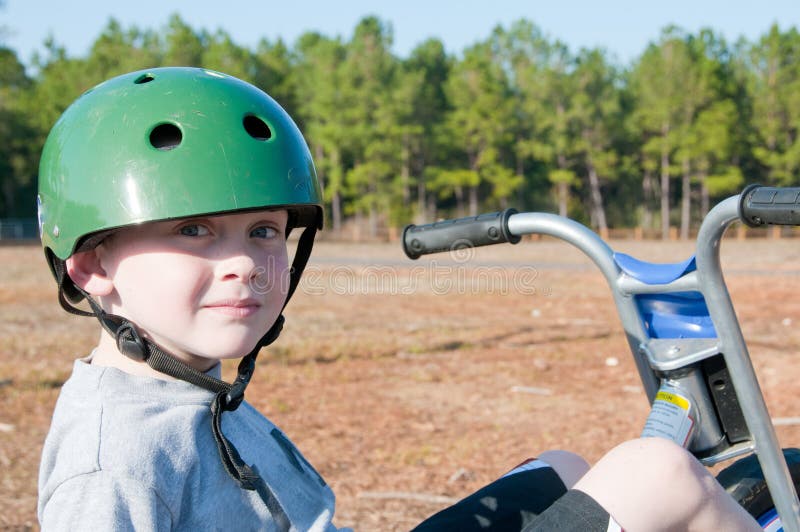 Boy riding trike