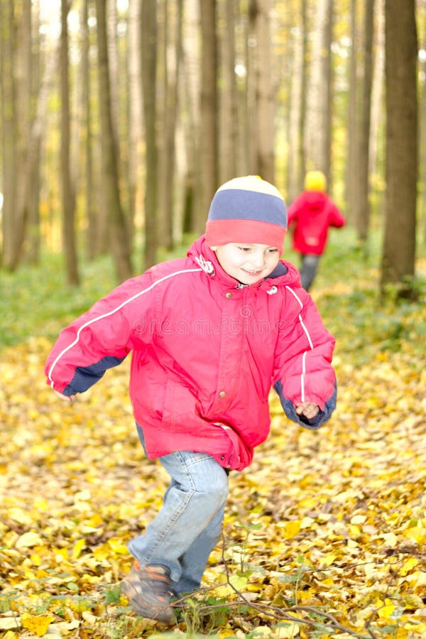 Boy running in forest stock photo. Image of child, caucasian - 7677986