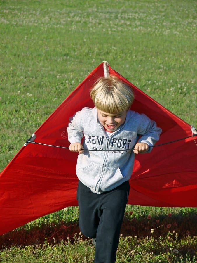 Boy Running with Kite