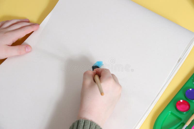 Boy's Hands Painting on Tablet royalty free stock photo Boy's Hands Painting on Tablet royalty free stock photo