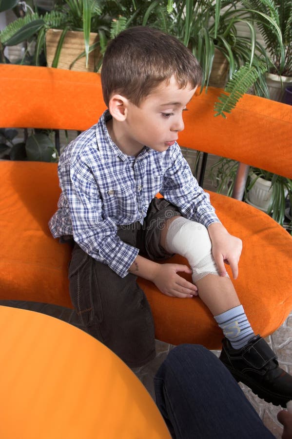 Boy's Leg Bandage Stock Images Image 6969434