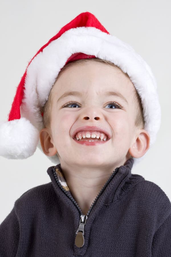 Handsome baby boy wearing a santa hat portrait. Handsome baby boy wearing a santa hat portrait
