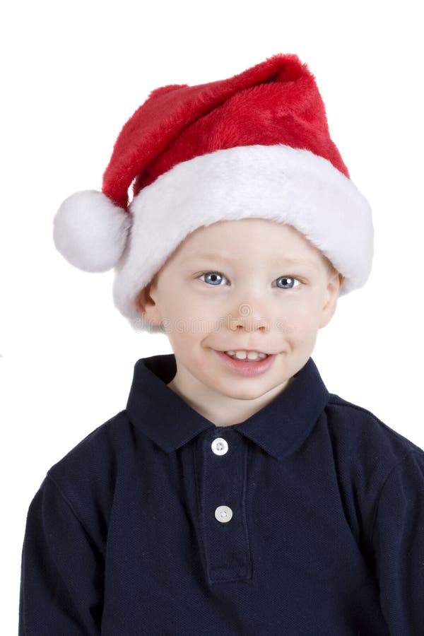 Handsome boy in santa claus hat isolated on white. Handsome boy in santa claus hat isolated on white