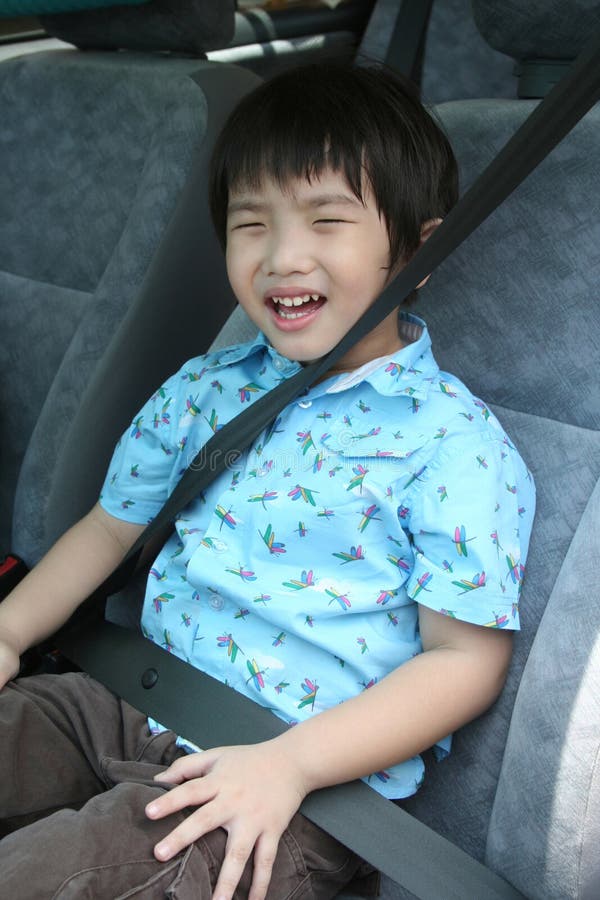 Boy with seatbelt stock photo. Image of child, reading 2191374