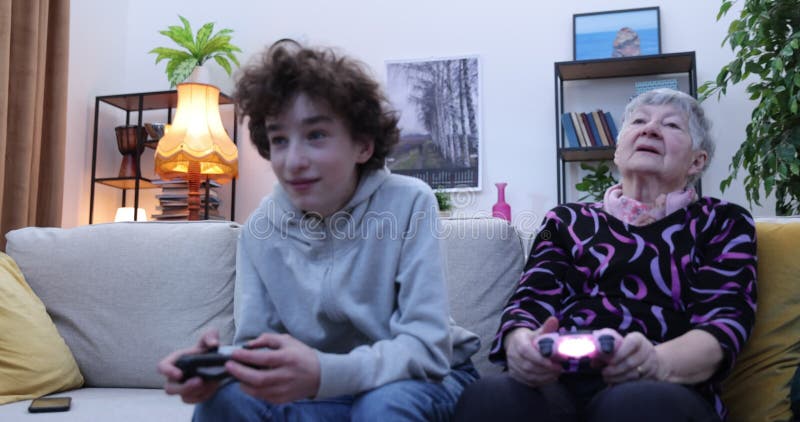 Grandma Grandson Homemade Videos - Boy and Senior Women Playing Video Game on Console. Grandmother and Grandson  Playing Video Games Using Gamepads at Home Stock Footage - Video of grandson,  happy: 238549740