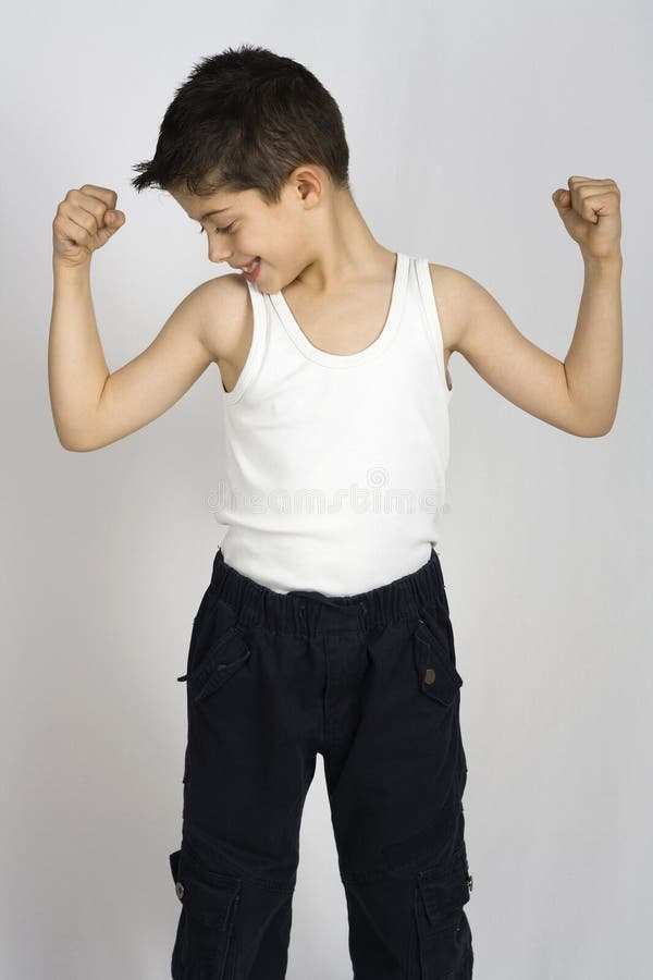 Boy shows his muscles