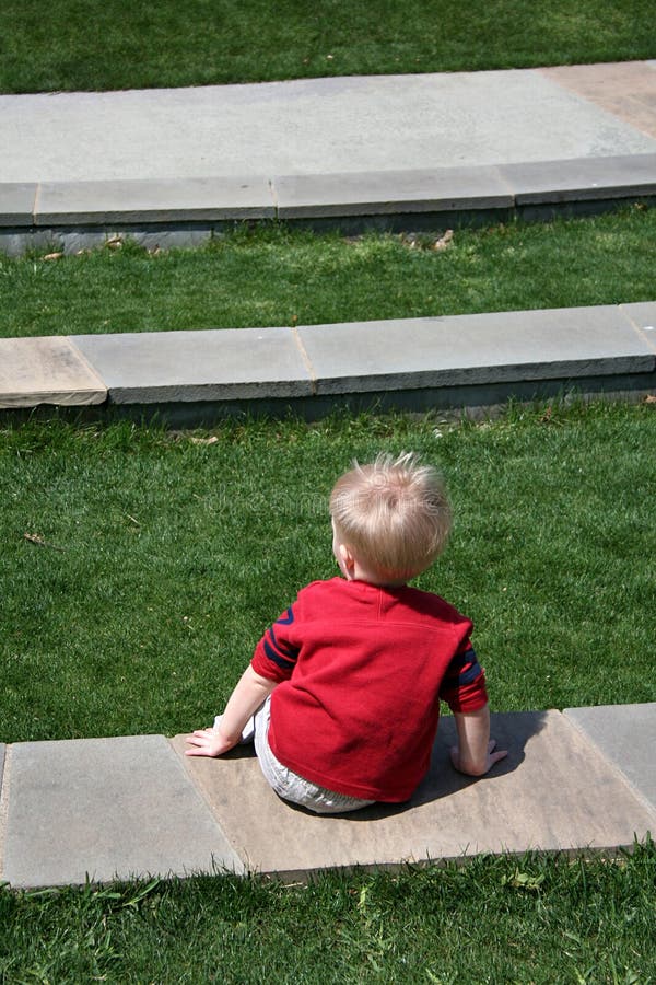 Boy Sitting Alone