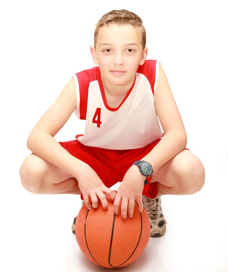 Boy sitting with the ball