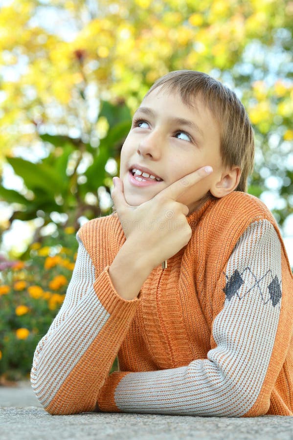 Boy sitting at table stock photo. Image of portrait, individuality