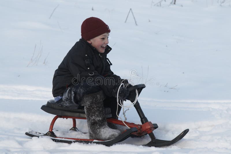 A boy on the sledge