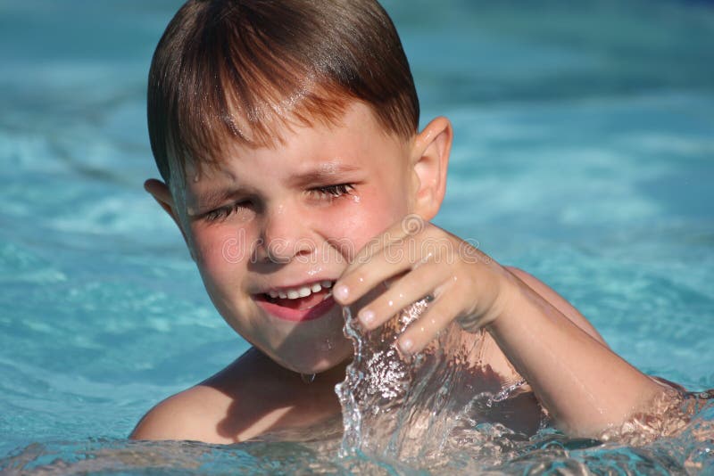 Boy Smiling in Swimming Pool Stock Image Image of summer, outside