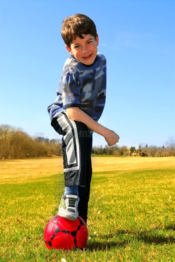 Boy with soccer ball stock photo. Image of play, holding 2296614