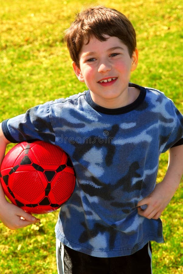 Boy with soccer ball stock photo. Image of play, holding 2296614