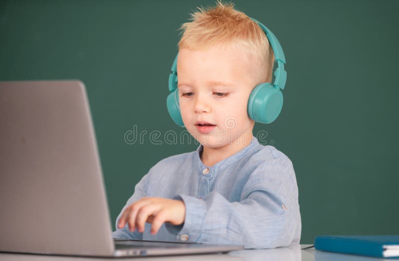 Boy student learning online in class. Kid study online video call with zoom. Pupil child learn english language online stock images