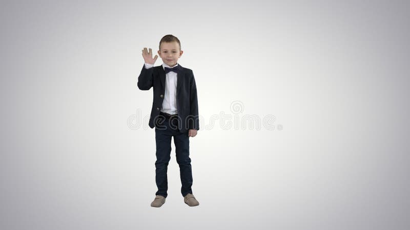 Boy in a suit greeting you Walks in and out on gradient background.