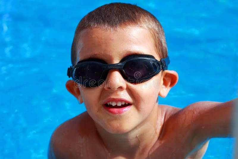 Boy in swiming pool