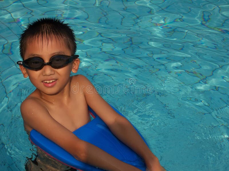 Boy swimming stock photo. Image of movement, face, male 12330634