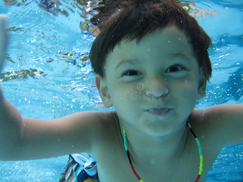 Boy swimming stock photo. Image of breadth, color, swim 985426