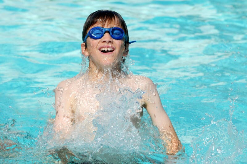 Boy in swimming pool stock photo. Image of cheerful, splash 11139368
