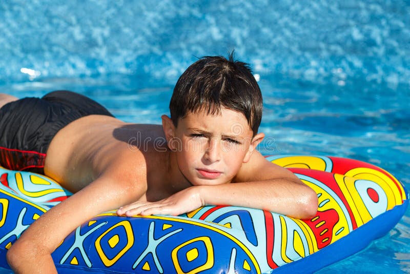 Boy in swimming pool. 