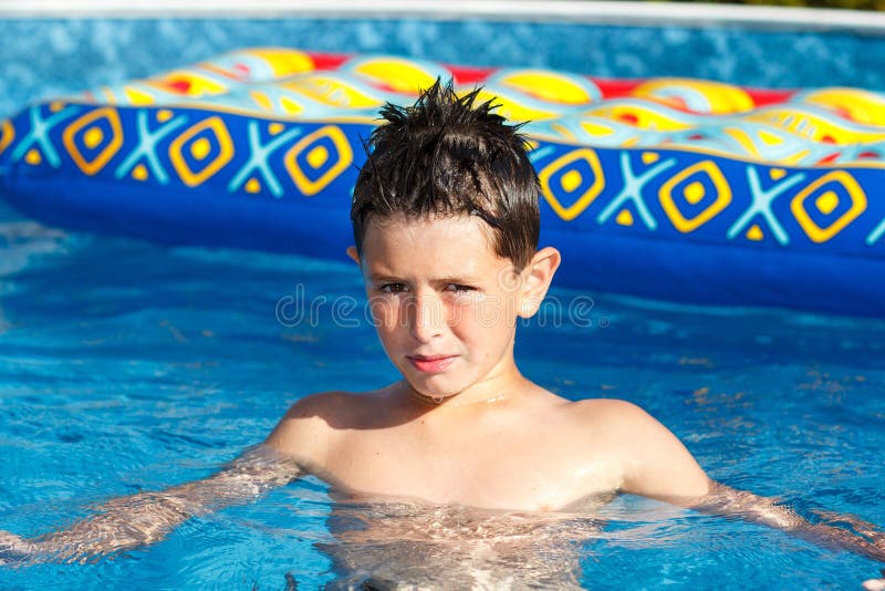 Boy in swimming pool stock photo. Image of child, leisure 25626772