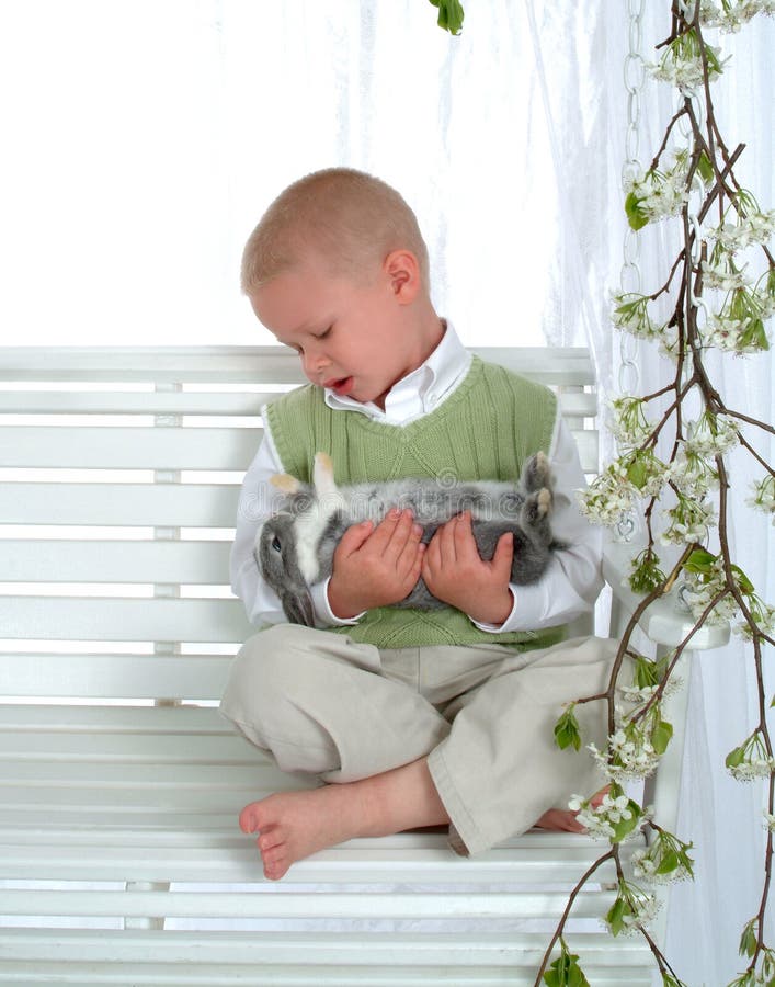 Boy on Swing with Bunny