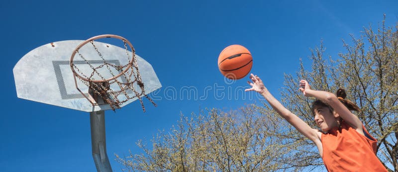 Boy Taking a Basketball Shot Stock Photo - Image of panoramic, training