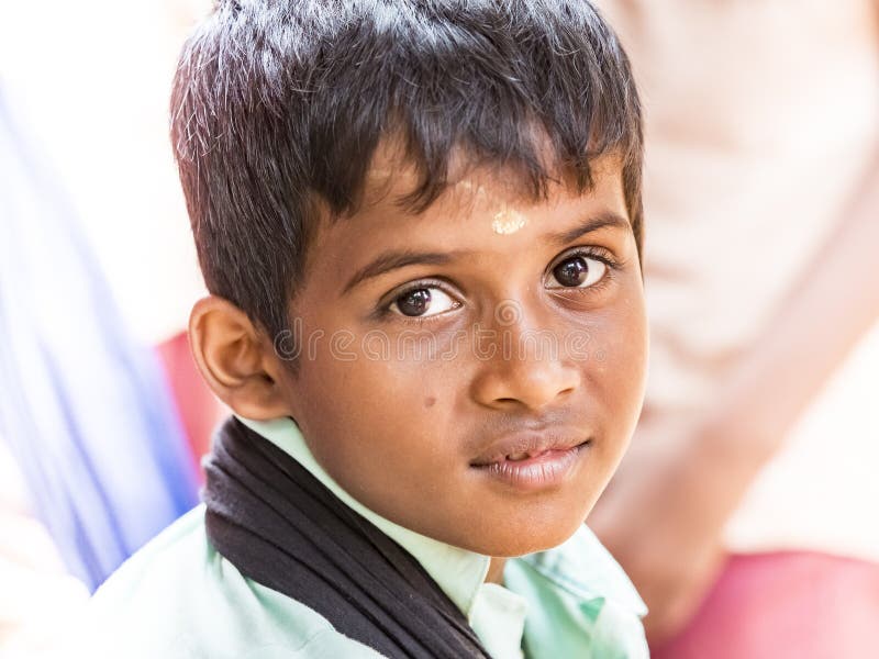 Profile of a Teenage Indian Boy Looking at outsides Stock Photo