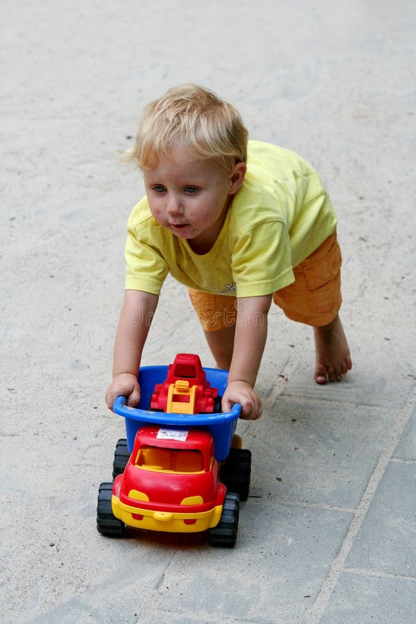 Boy and toy car