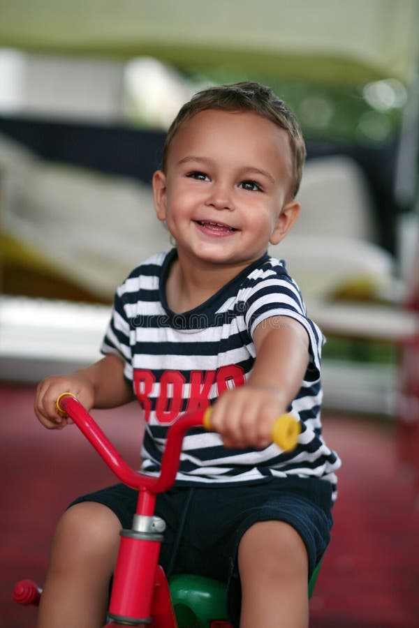 Little boy on a tricycle