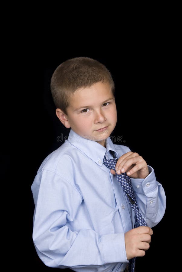 Boy tying his necktie stock photo. Image of necktie, concepts 9264304